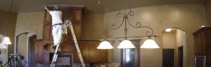 A Paint It OKC Painter is adding the finishing touches to an interior painting job in north Oklahoma City.