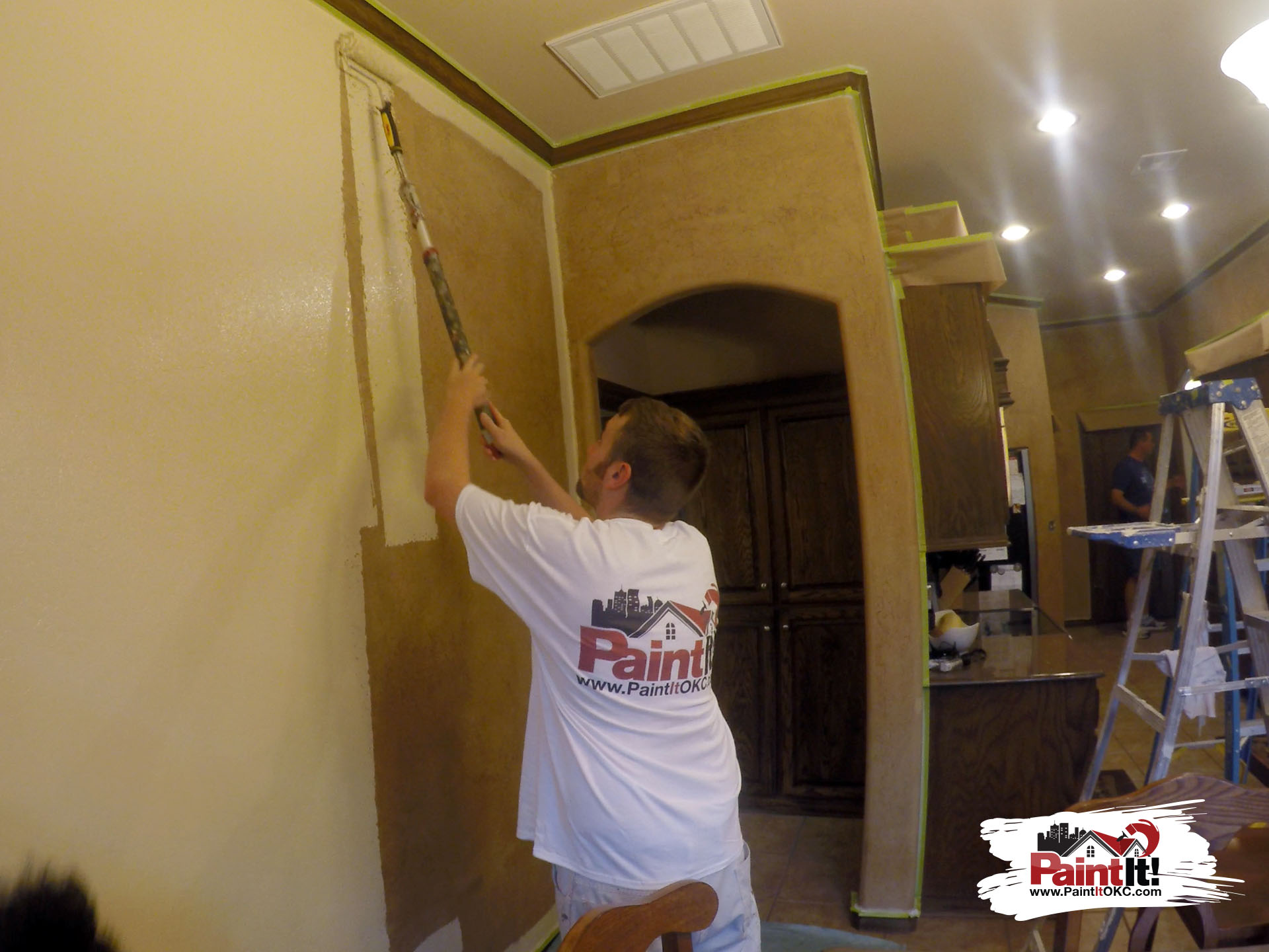 an okc painter paining a kitchen in oklahoma