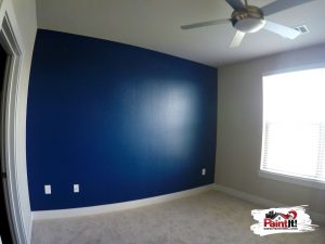 a recently painted blue bedroom wall