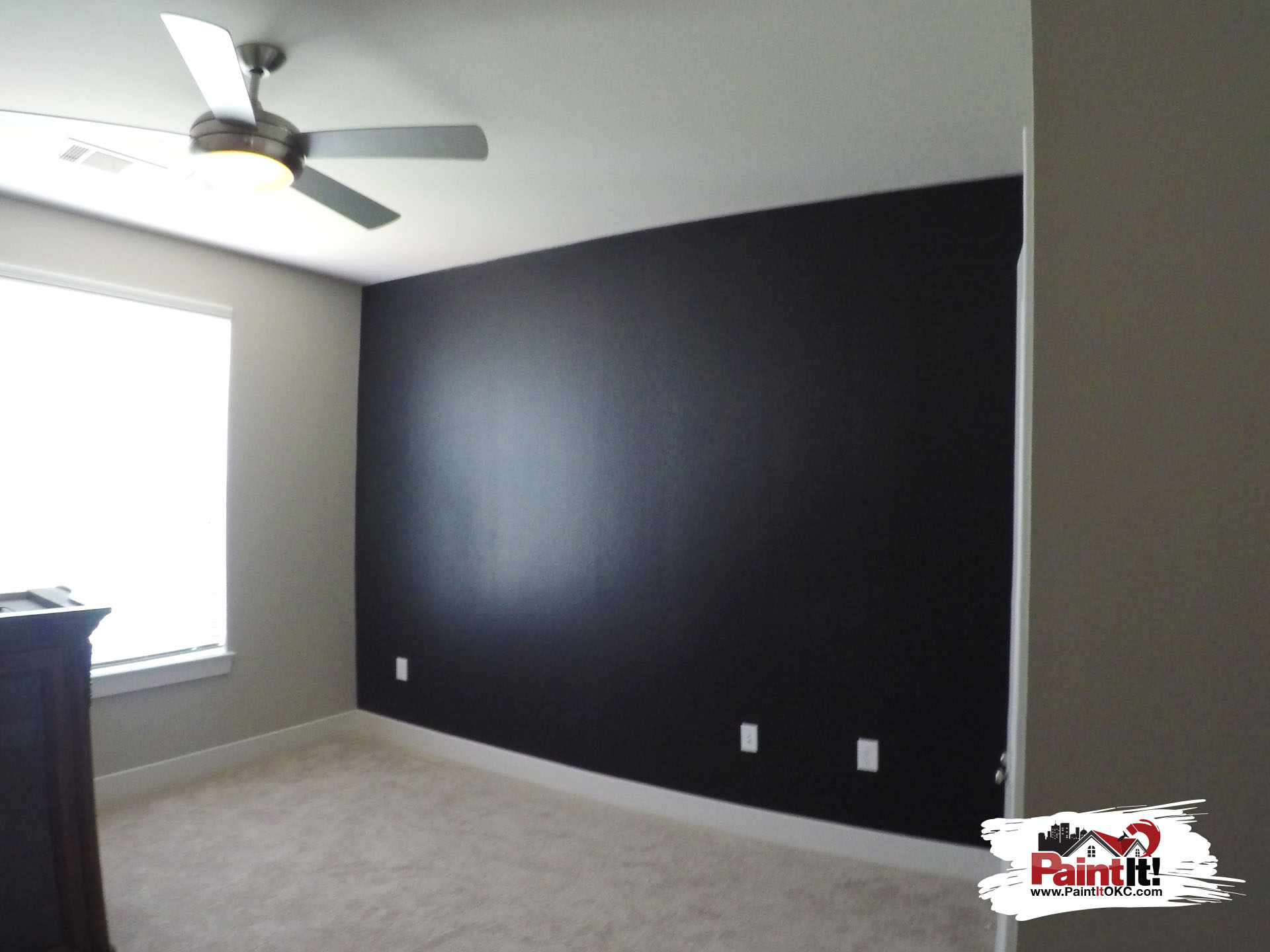 a black wall recently painted